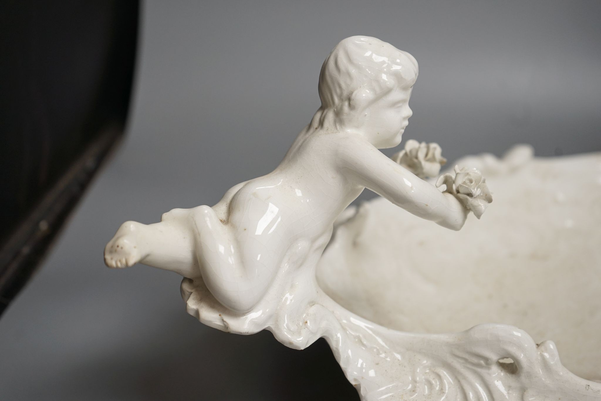 An Italian glazed pottery centrepiece, 63cm